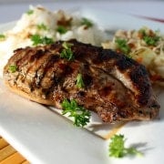 Image of a grilled chicken breast that's been marinated in an Asian style marinade.