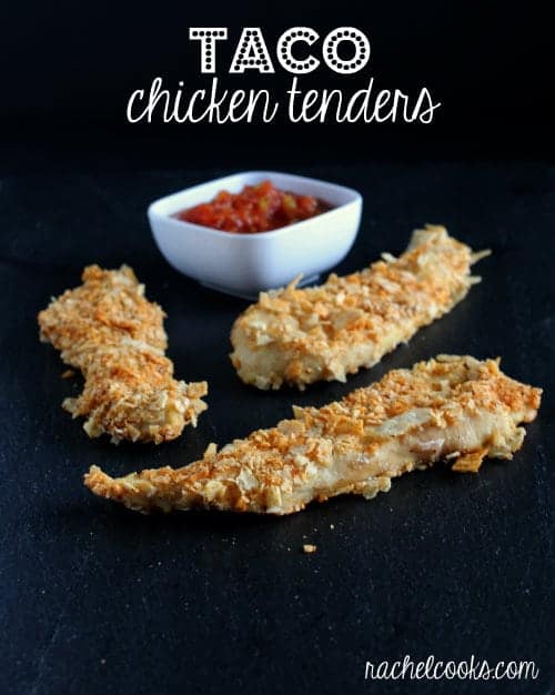 Three chicken tenders with small white bowl of salsa, on black background. Text overlay reads "Taco chicken tenders. Rachelcooks.com"