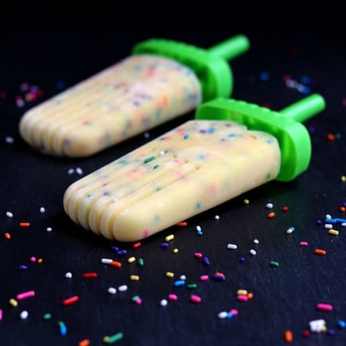 Easy to make, festive, and fun, these funfetti pudding pops will be a fun treat for the whole family. Kids especially love these! Get the popsicle recipe on RachelCooks.com!