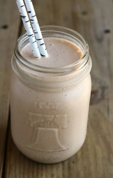This Peanut Butter Chocolate Banana Milkshake is cool, refreshing and perfect for a hot summer day. And what better flavor combination is there? Milkshake recipe on RachelCooks.com!