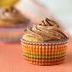 These Banana Cupcakes with Chocolate Cream Cheese Frosting are the perfect combination of banana and chocolate.  The sweet filling inside makes them very special.  Get the fun and easy recipe at RachelCooks.com!