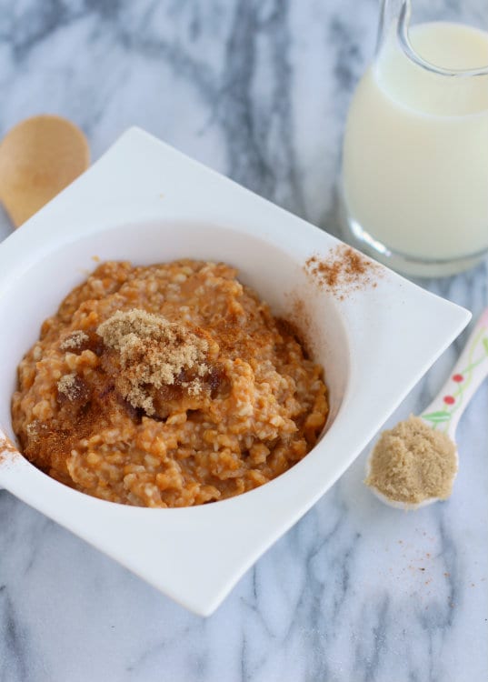 These slow cooker pumpkin pie steel cut oats are perfect for fall (or any time of year) and couldn't be easier to make. Who wouldn't want to wake up to a hot breakfast? Get the easy recipe on RachelCooks.com!