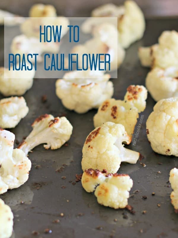 Front view of roasted cauliflower on baking pan with text overlay reading "How to Roast Cauliflower."