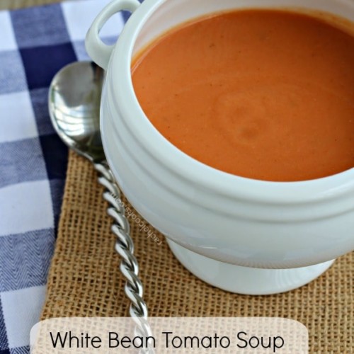 White footed ceramic bowl containing tomato soup.| RachelCooks.com