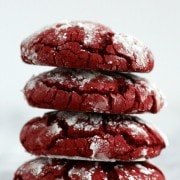 Stack of four red velvet cookies.