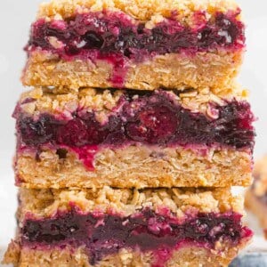 Stacked blueberry crumb bars.