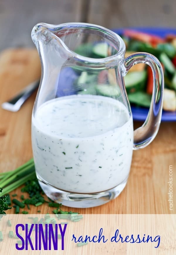 Ranch dressing in a small glass pitcher.