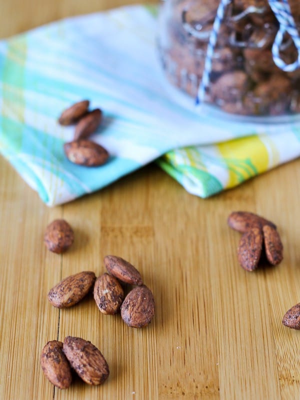 Almonds on a wooden surface.