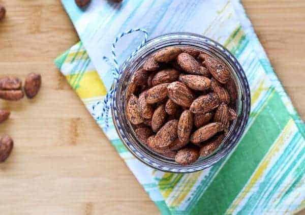 Overhead view of almonds in a jar.