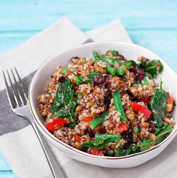 Salad with wheat berry, quinoa, red bell pepper, baby kale.