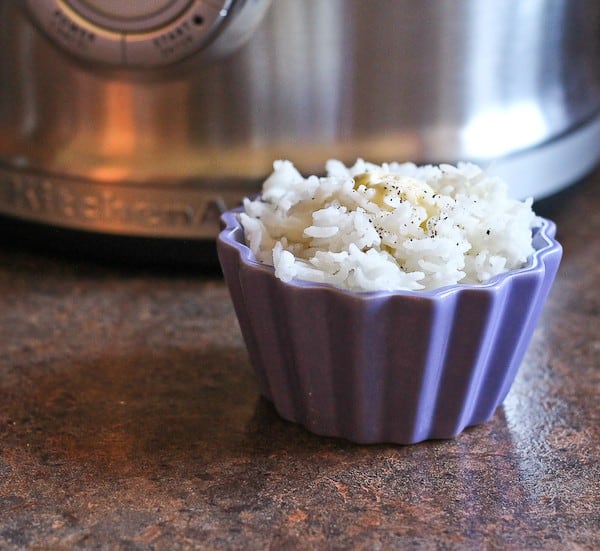 Rice in small purple dish.