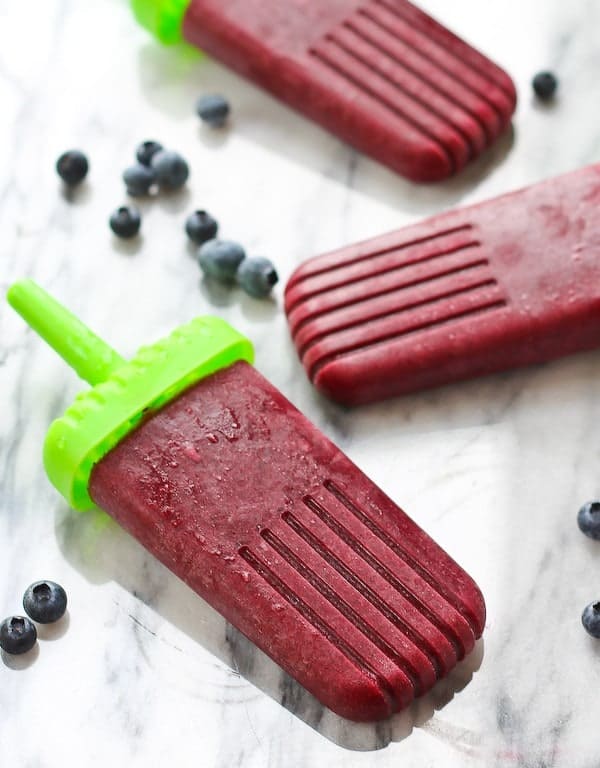 Tart Blueberry Lemon Popsicles - the perfect summer refreshment! Get the easy recipe on RachelCooks.com