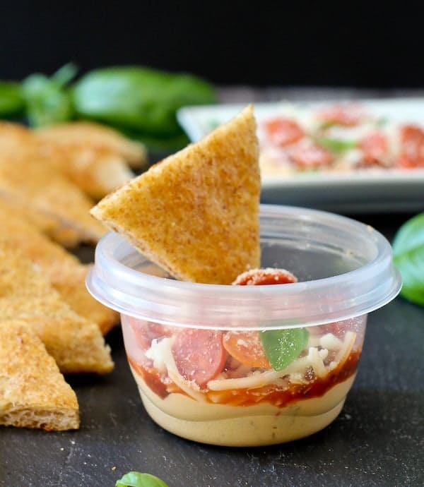 Pepperoni Pizza 6 Layer Hummus Dip - great for school lunches! Get the easy recipe on RachelCooks.com! 