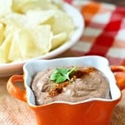 This healthy and creamy southwestern black bean dip only uses four ingredients and one packs an extra punch of protein. You'll love this for dipping or for spreading on sandwiches. Get the easy appetizer or snack recipe on RachelCooks.com!