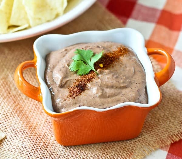 This healthy and creamy southwestern black bean dip only uses four ingredients and one packs an extra punch of protein. You'll love this for dipping or for spreading on sandwiches. Get the easy appetizer or snack recipe on RachelCooks.com!