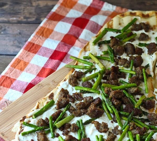 Grilled Pizza with Ricotta, Asparagus and Sausage - Get the easy recipe that's perfect for summer on RachelCooks.com! 