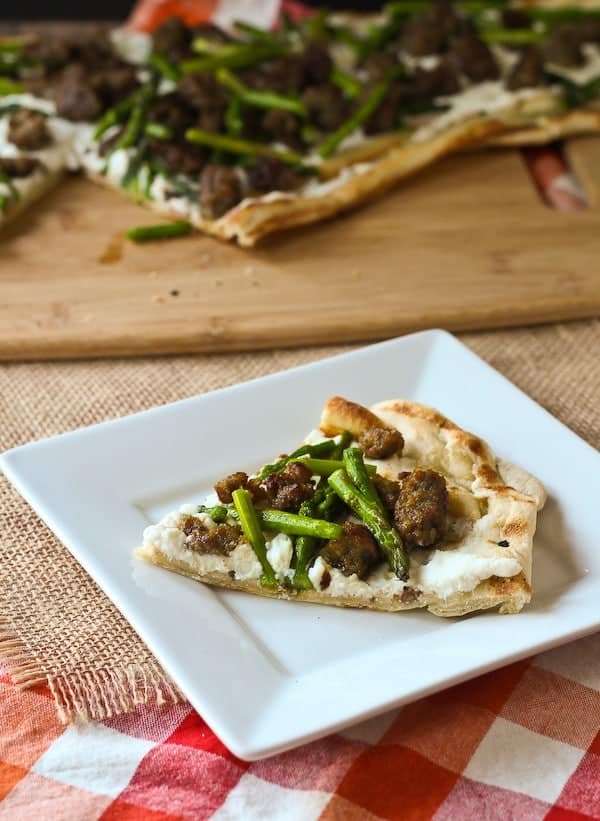 Grilled Pizza with Ricotta, Asparagus and Sausage - Get the easy recipe that's perfect for summer on RachelCooks.com! 