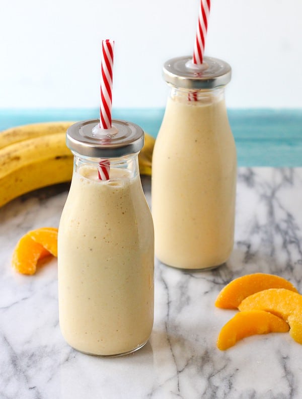This peach banana and honey smoothie is a perfect snack or breakfast for kids and adults. A secret ingredient gives an extra boost of protein! Get the easy recipe on RachelCooks.com