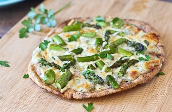 Pita Flatbreads with Asparagus and Creamy Cottage Cheese Sauce - Get the easy and delicious summertime recipe on RachelCooks.com!
