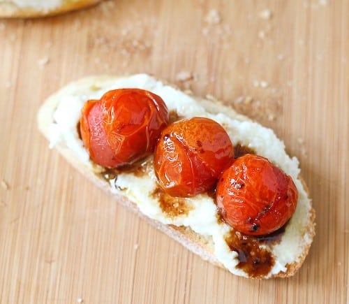 Overhead closeup of single crostini with balsamic glaze.