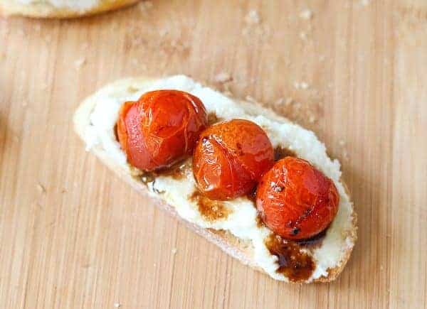 Overhead closeup of single crostini with balsamic glaze.