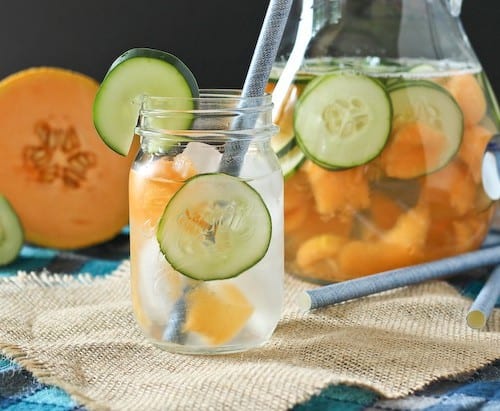 Cantaloupe and cucumber water is not only ridiculously refreshing on a hot summer day, it's also beautiful to look at! Get the easy recipe on RachelCooks.com!