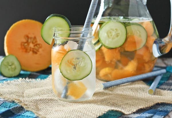 Cantaloupe and cucumber water is not only ridiculously refreshing on a hot summer day, it's also beautiful to look at! Get the easy recipe on RachelCooks.com!