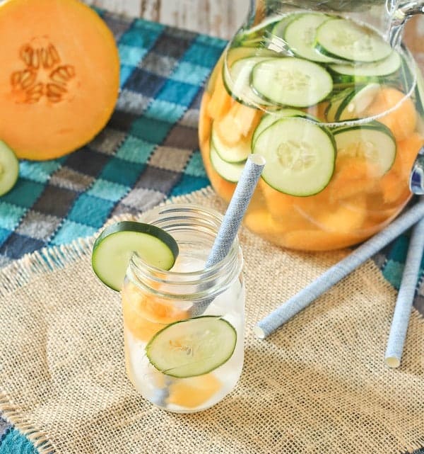 Cantaloupe and cucumber water is not only ridiculously refreshing on a hot summer day, it's also beautiful to look at! Get the easy recipe on RachelCooks.com!