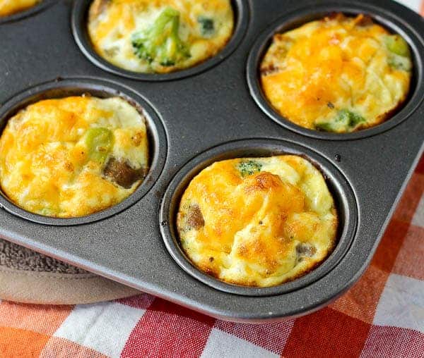 egg white muffins in pan close up with broccoli