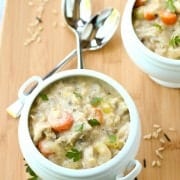 This Slow Cooker Creamy Chicken and Wild Rice Soup will be the star of your winter cuisine! Perfect for chilly days. Get the easy recipe on RachelCooks.com!