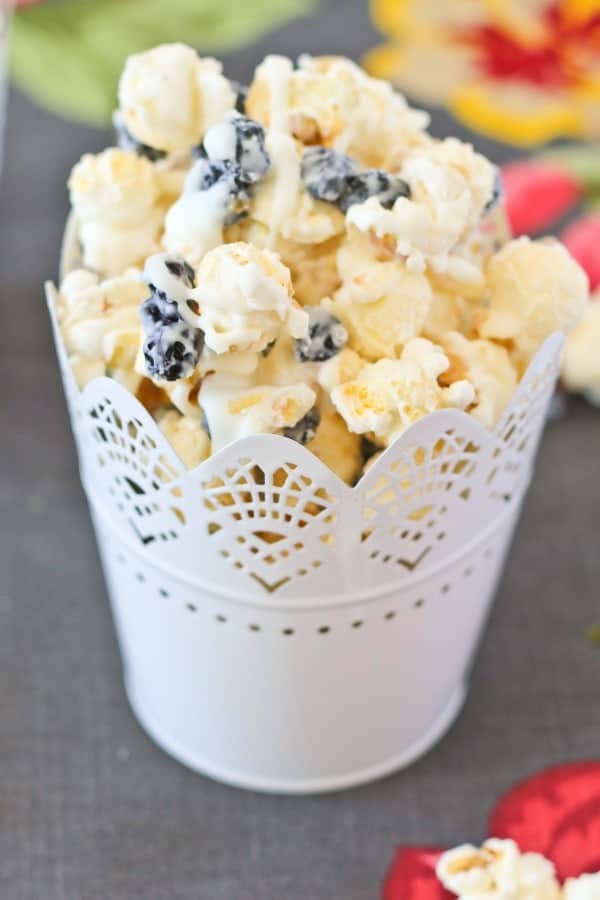 Closeup front view of popcorn in cup.