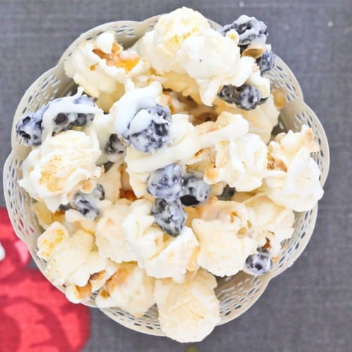 Blueberries & Cream Popcorn is hard to resist. What a unique treat to make for your family! Get the easy recipe on RachelCooks.com!