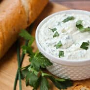 This herbed feta dip recipe will be the star of your next holiday gathering! It's tangy and unbelievably flavorful thanks to tons of fresh herbs - including one that may surprise you! Get the easy appetizer recipe on RachelCooks.com!