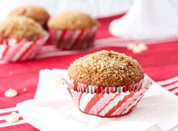 Gingerbread Muffins with White Chocolate Chips are perfect for Christmas morning or any other morning. The crunchy sugar topping makes them completely irresistible. Get the recipe on RachelCooks.com!