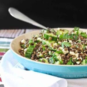 Filling, satisfying, and flavorful. This lentil salad recipe with feta, lemon, and parsley is perfect for meal prep days and stores well in the fridge for healthy eating all week. Get the healthy recipe on RachelCooks.com!