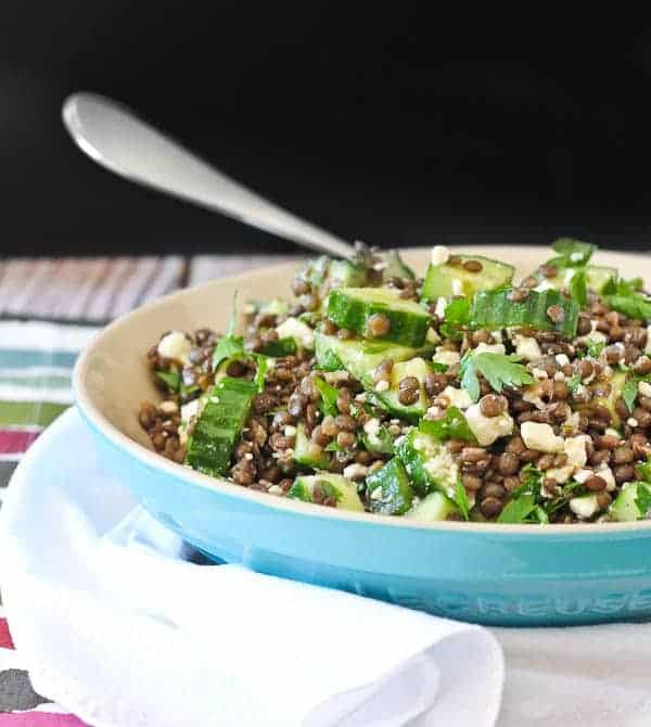 Filling, satisfying, and flavorful. This lentil salad recipe with feta, lemon, and parsley is perfect for meal prep days and stores well in the fridge for healthy eating all week. Get the healthy recipe on RachelCooks.com!