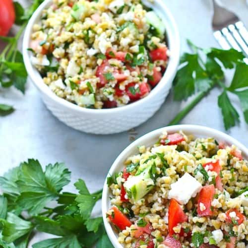 Healthy lunch alert! This tabbouleh salad recipe with freekeh and feta is a filling and satisfying lunch. Prepare to be obsessed with freekeh. Get the healthy recipe on RachelCooks.com!
