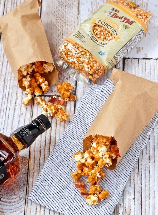 Take your caramel corn game to the next level with this homemade caramel corn with bourbon and bacon. You'll love the salty sweet combination of this irresistible snack. Get the easy recipe on RachelCooks.com!