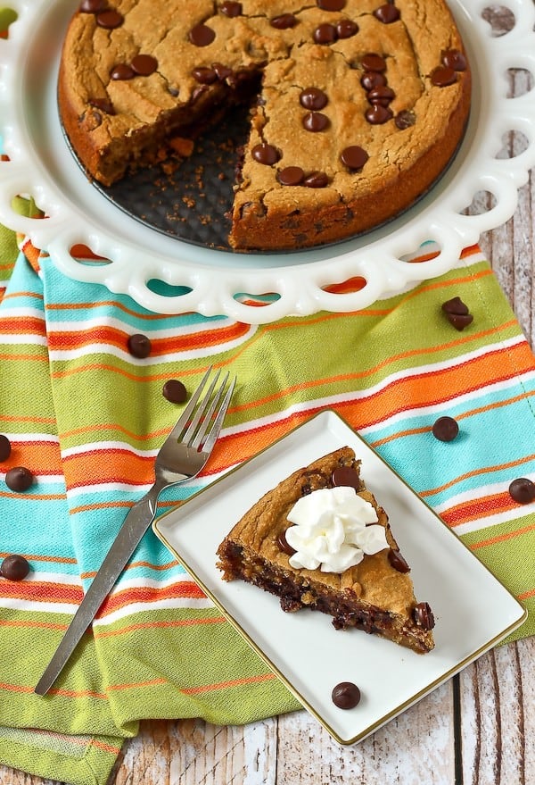 Deep dish cookie wiht a slice removed.