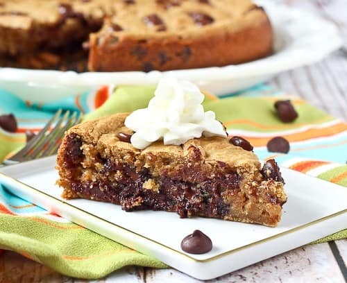 Although still a treat, this healthy chocolate chip cookie recipe is one you can feel good about! Bonus: Made in minutes in a blender AND DEEP DISH - so gooey and delicious! PS: The beans in this cookie add moisture and protein! Get the healthy dessert recipe on RachelCooks.com!