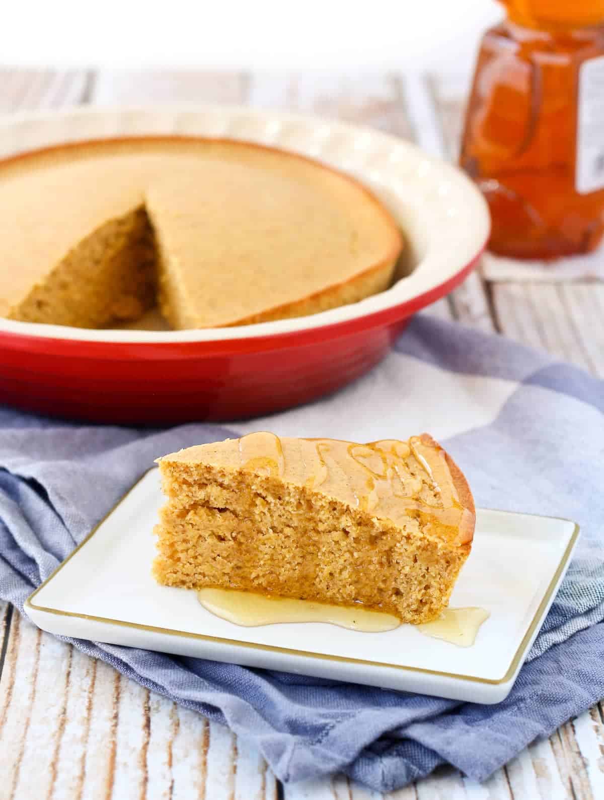 Slice of healthy cornbread on a plate.