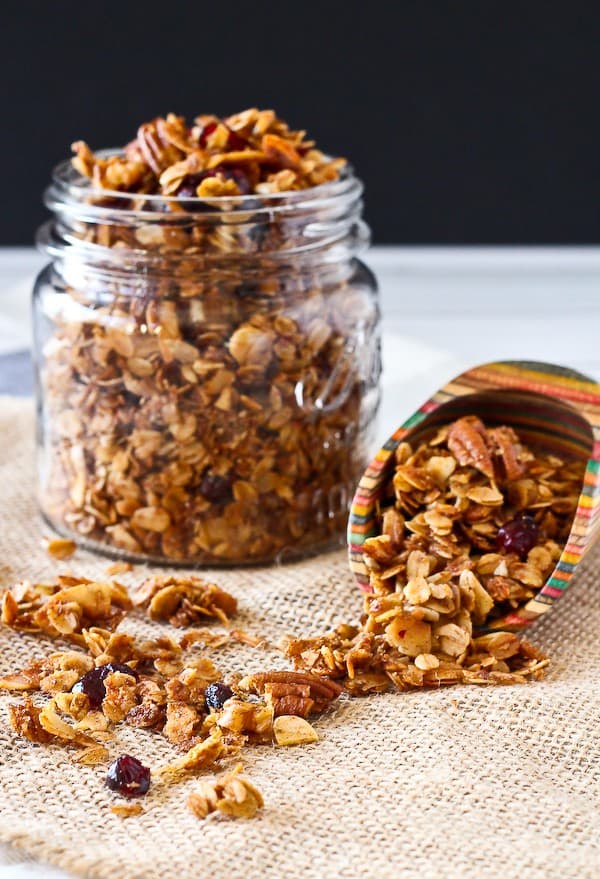 Granola in a jar and in a scoop.