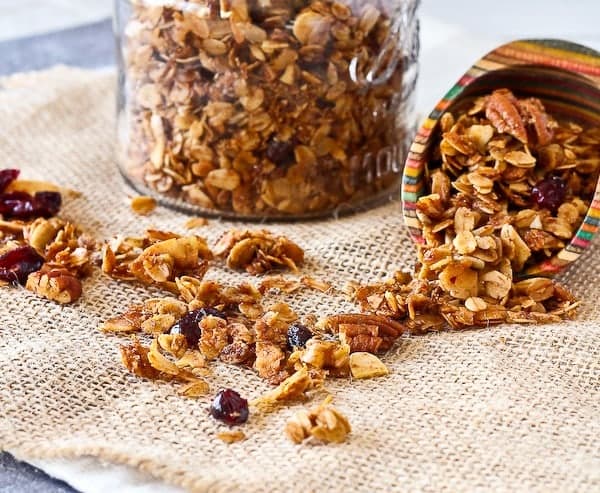 This easy granola recipe with pecans and cranberries will become your go-to granola recipe - you won't ever be buying granola from the store again. This is way too easy! 