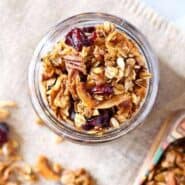 This easy granola recipe with pecans and cranberries will become your go-to granola recipe - you won't ever be buying granola from the store again. This is way too easy! Get the recipe on RachelCooks.com!