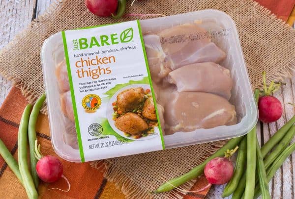 Overhead of package of Just BARE Chicken Thighs.