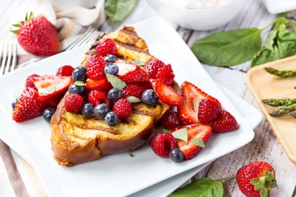 Take your brunch to the grill! This grilled french toast and its strawberry basil cream cheese stuffing will be the perfect brunch centerpiece! Get the recipe on RachelCooks.com!