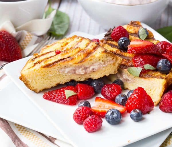 Take your brunch to the grill! This grilled french toast and its strawberry basil cream cheese stuffing will be the perfect brunch centerpiece! Get the recipe on RachelCooks.com!