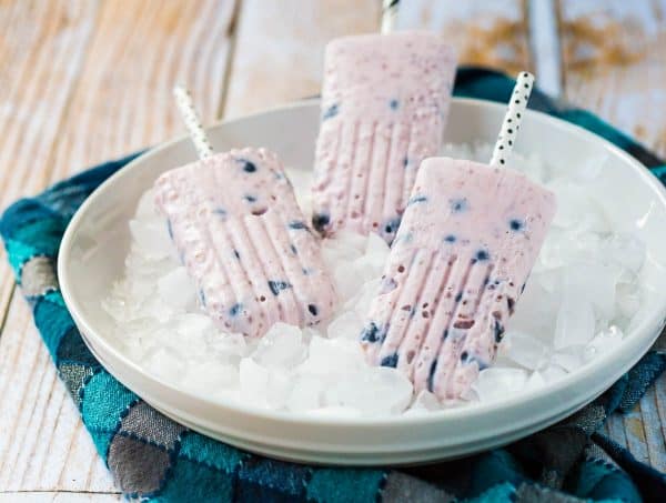 Ditch the artificially flavored and unnaturally colored popsicles in favor of these yogurt popsicles with berries and chia. Your body will thank you. With only 2 ingredients, they're SO easy to make! Get the easy summer recipe on RachelCooks.com!