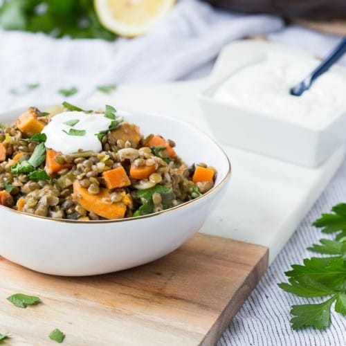 One Pot Green Lentils with Sweet Potatoes and Kale are a hearty vegetarian meal - easy to make and packed with nutrition and flavor, these are sure to become a favorite! Get the vegetarian recipe on RachelCooks.com!