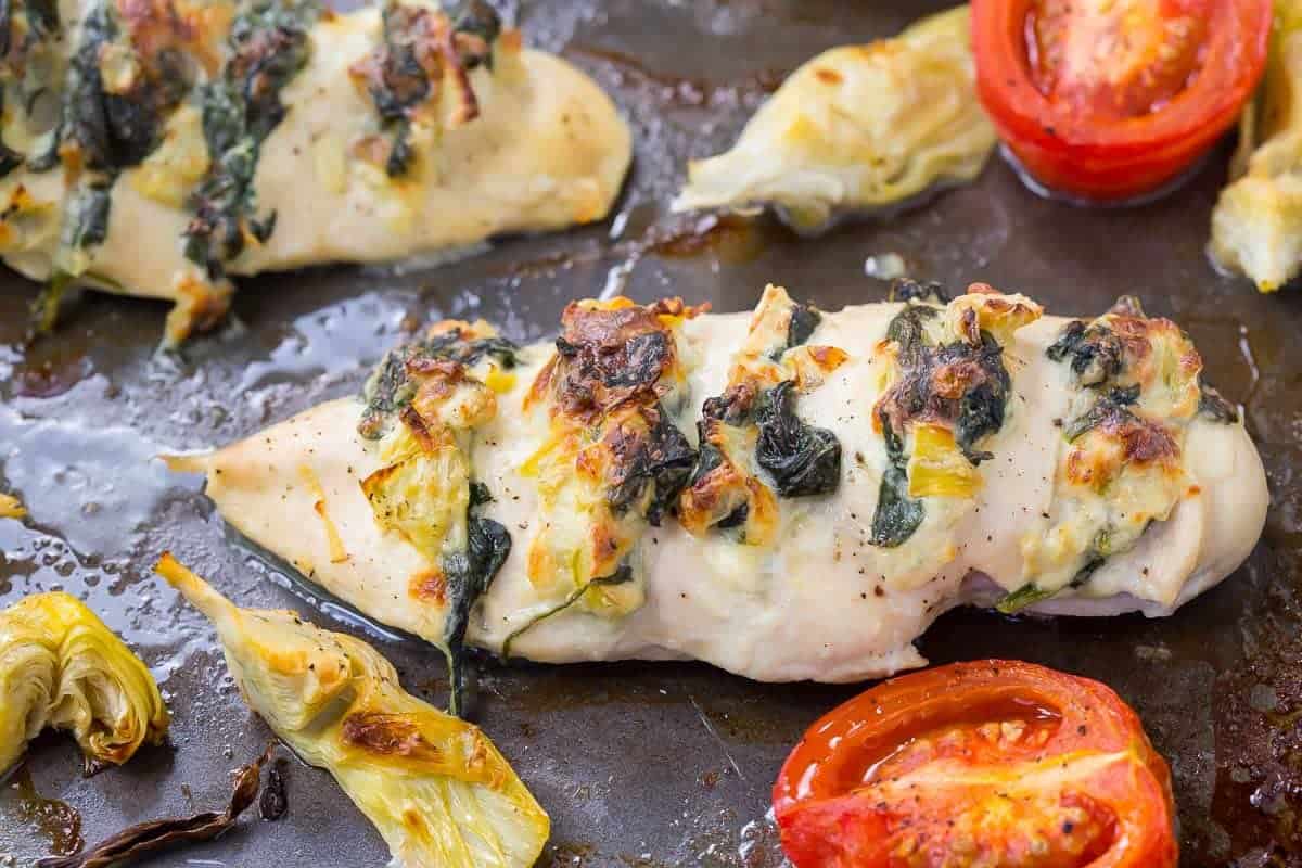 Closeup of chicken in roasting pan.